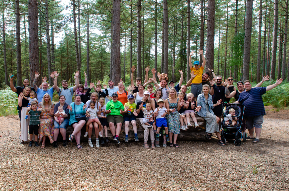 Group of campers posing for a photo in the New Forest Moors Valley Country Park