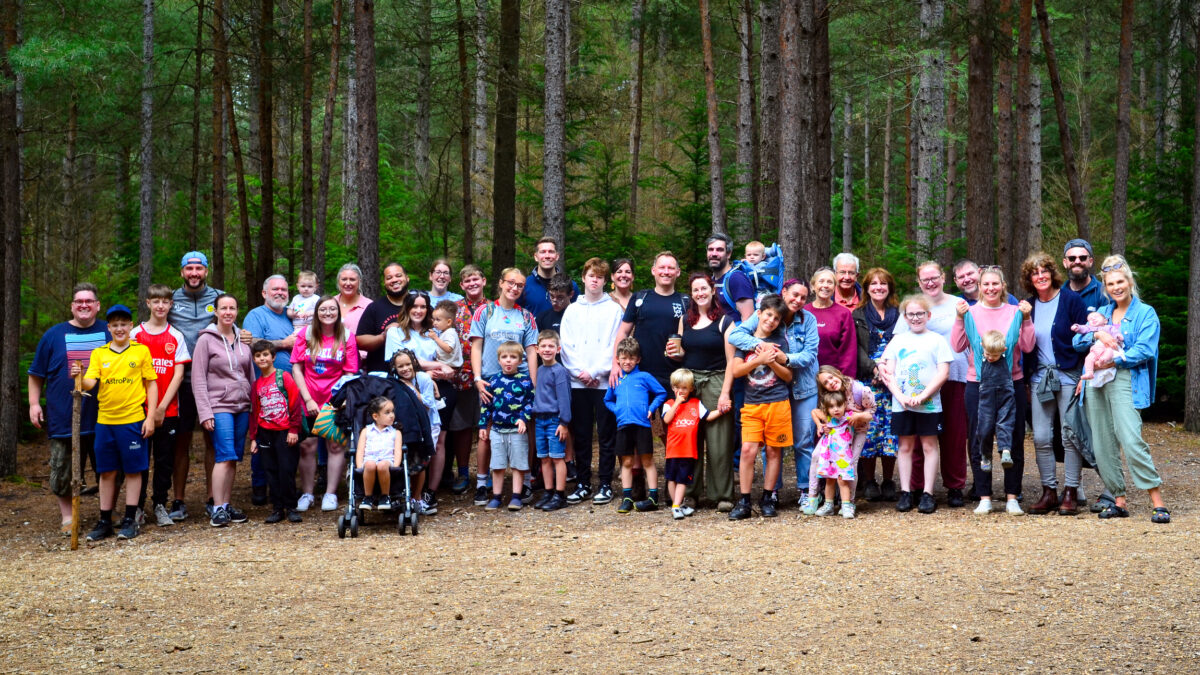 Group of campers posing for a photo in the New Forest Moors Valley Country Park
